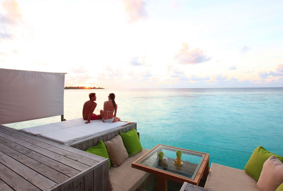 975x660_water_villa_deck_sunset4