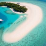 Aerial view of a private yacht by a secret island.