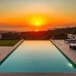 Luxurious villa with pool and sunset view.